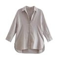 Detail of taupe linen shirt featuring a classic collar and buttons with textured fabric - XS / Lead Grey