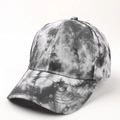 Detail view of 3D tie-dye pattern and reinforced stitching on the baseball cap brim - Adjustable / Smokey White Tie-Dye