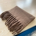 Brown mohair scarf with thick fringes shown folded on a wooden surface for winter - Khaki (17#)