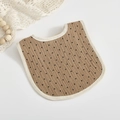 Babero de muselina de algodón marrón con lunares negros y ribete beige para bebés - Caqui con Lunares