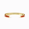 Golden C-shaped stainless steel bracelet with red enamel and engraved crown quote - Girls / Red