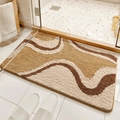 Plush bathroom mat with beige and brown wave patterns on terrazzo flooring - Feras Wave / Bath Mat 40*60cm