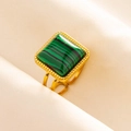 Detail of vintage gold ring featuring a square green malachite stone and hollow band - Gold/Green Malachite