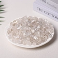 Polished natural clear quartz crystal chips in a white dish for decor and cleansing - 100 Grams Of Ordinary White Crystal (9-12mm)