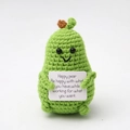 Handmade green crochet pear doll holding a white card with motivational message - Ya Pear with Green Limbs