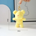 Plush yellow bear keychain with gold ring, measuring 15cm high by 10cm wide - Yellow / Gold Keychain