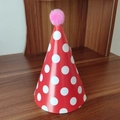 Red party hat with white polka dots and a soft pink pom-pom top for birthday celebrations - Red Large Polka Dot Pom-pom Hat