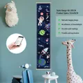 Space-themed children height growth chart with wooden frames and astronaut illustration - Style 4 (Space Exploration)