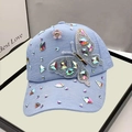 Light blue baseball cap featuring colorful crystal rhinestones and a 3D butterfly patch - Adult, Adjustable / Blue