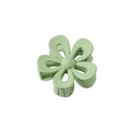 Detailed view of pale green flower hair claw clip with matte finish and metal spring - Hollow-Green