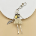 Handmade doll keychain with pearl head, blue woven top, yellow rose, and beige fringe tassel - 22-Ethic Style Fringe Doll