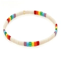 Bohemian TILA bead stretch bracelet in white with rainbow color accents and gold bead - White Rainbow Mix