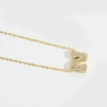 Gold-plated letter N pendant necklace with shimmering pave-set cubic zirconia stones - Letter N