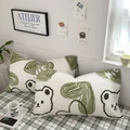 Minimalist white pillowcases with green abstract patterns and black cartoon bear prints - Forest Bear