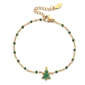 Detail of a gold stainless steel beaded bracelet with a green enamel Christmas tree charm - Green