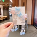 Girls butterfly hair clips with blue petals and silver metallic tassels on a display card - 88# Crystal Blue Butterfly Pair Clips