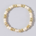 Handmade beaded ring featuring cream faux pearls and gold metal accent beads - Pearl White and Gold