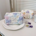Detail of quilted cotton makeup bag with floral prints and chic French text embroidery - Oil Painting Pink Purple Floral