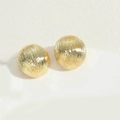 Macro shot of gold hemispherical earrings featuring unique radial brushed texture - Brushed Style (ES2424-5) / Gold