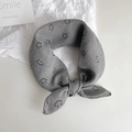 Gray baby cotton scarf with a black smiley face print shown in a tied knot display - 45cmx45cm / Gray