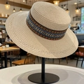 Beige flat top straw sun hat featuring ethnic colorful geometric patterned ribbon trim - Beige Bohemian Style Straw Hat (D-490)