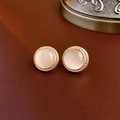 Vintage gold-finish round stud earrings featuring beige cat eye stones on a leather surface - 15# Gold Silver Post