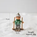 Christmas reindeer snow globe ornament with green sweater skier and 7cm height - Skiing Boy Figurine (30g)