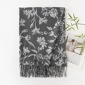 Dark grey faux cashmere scarf with light grey floral print and tassel edges on white - Grey White Floral