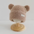 Detail of warm plush beige hat featuring bear ears with lace trim and HOY woven label - 52-54cm (3-8 Years) / Brown