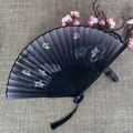 Classic black silk folding fan featuring lotus and dragonfly patterns with a black tassel - No.08 Black Lotus Dragonfly
