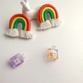 Handmade woven rainbow keychain pendant with colorful yarn tassels in red yellow and blue - Outer Tangerine