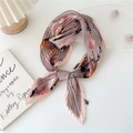 Pleated square scarf with abstract floral print tied in a bow on a white backdrop - 70cm / Purple Floral