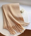 Maillard style beige knit scarf with soft long tassels on a minimalist tray - Solid Oatmeal
