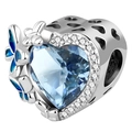 Macro view of heart-shaped blue gemstone charm with enamel butterfly and silver details - Blue Butterfly Heart Charm