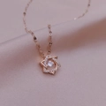 Rose gold hexagram necklace with zircon and star pendant on champagne silk background - Rose Gold