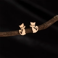 Cute rose gold minimalist cat-shaped stainless steel stud earrings on a wooden branch - 753 Rose Gold