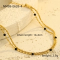 Macro shot of gold double-layer chain with black beads on a natural stone background - 16+4cm / Black (NMSB-E628-4)