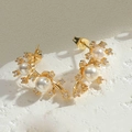Detailed close-up of gold flower earrings with white pearls and sparkling cubic zirconia - Double Pearl Stud Earrings (ES2367-4)