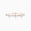 Rose gold ring featuring three light blue four-leaf clover motifs on a white background - Blue Flower-Rose Gold