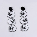 Halloween triple skeleton acrylic dangle earrings in classic black and white colorway - Triple Skeleton