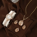 Detailed set featuring a golden quartz watch with pink gemstones and matching jewelry - Rose Gold Peacock Jewelry Set