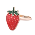 Detailed view of a red strawberry napkin ring with gold seeds and green enamel leaf detail - Strawberry