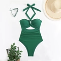 Deep green one-piece swimsuit with halter neck, cutout details, and flat lay accessories - S / Green