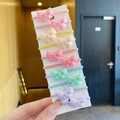 Set of 10 colorful mini bow hair ties in pink, yellow, purple and green for girls - Bowknot 10-Piece Set