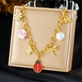 Detail of gold chain bracelet featuring colorful daisy, ladybug, and bee charms - Multi-Pendant Necklace (N3556)