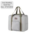 Foldable grey Oxford cloth travel bag in small size with sturdy brown handles - Small / Gray