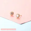 Elegant gold flower stud earrings with a central crystal and 0.7cm diameter size - Radiant Sun
