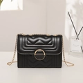 Chic black quilted crossbody bag for women with gold chain strap and metal clasp - Black
