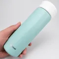 Slim mint green stainless steel insulated bottle with white lid and Casno logo - 400ml / Old Model No Filter / Light Green