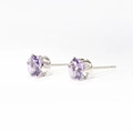 Polished silver six-claw stud earrings featuring brilliant lavender purple cubic zirconia - Purple